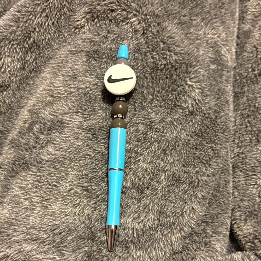 Nike Turquoise and Gray Pen